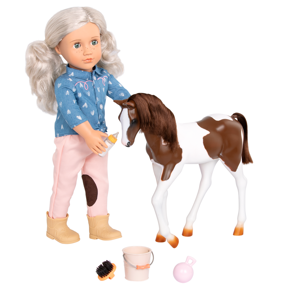 18-inch doll with silver hair, green eyes, horse accessories and toy foal