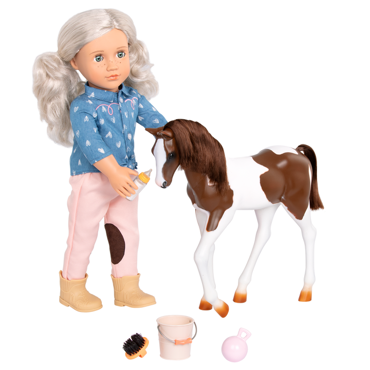 18-inch doll with silver hair, green eyes, horse accessories and toy foal
